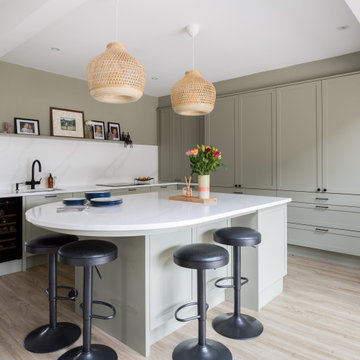 Bespoke Green, Painted, Modern, Shaker Kitchen With Curved Island in Leeds