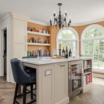 Warm Traditional Kitchen Remodel with Cream Cabinets & Herringbone Floors