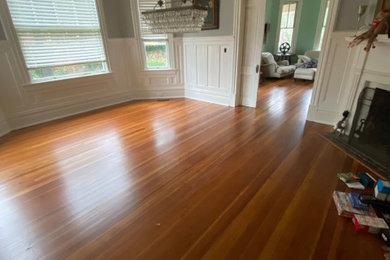 Photo of a medium sized traditional dining room in Atlanta with medium hardwood flooring and multi-coloured floors.