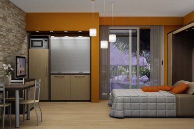 This is an example of a contemporary single-wall separate kitchen in Brisbane with no island and laminate benchtops.