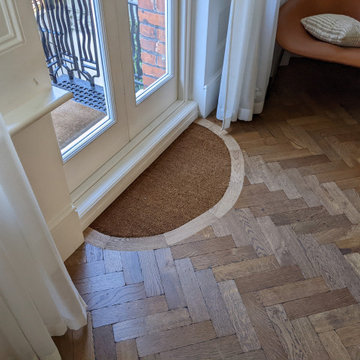 Aged effect herringbone parquet and traditional stair cladding | Chelsea SW5