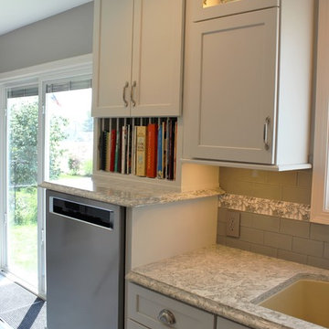 Alpha, IL White and Gray Kitchen with Hidden Laundry and Raised Dishwasher