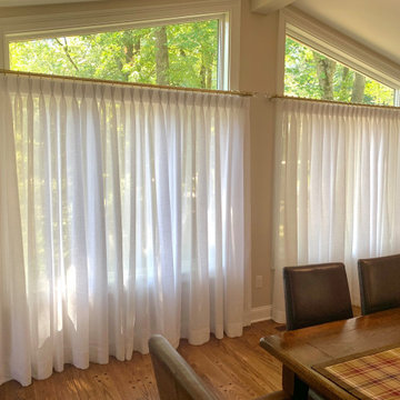 Pinch Pleat Sheer Linen Drapery Panels on TRAX Hardware in Dining Room