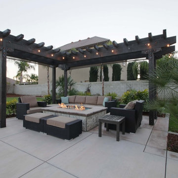Spanish Transitional Poolside Fire Pit with Timber Trellis