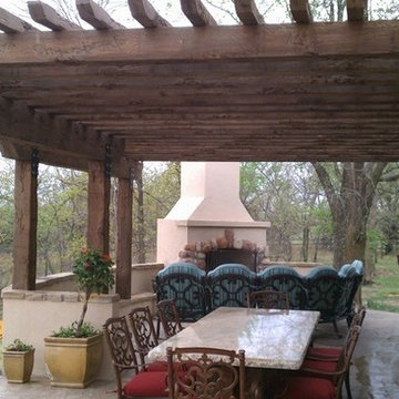 Rustic Wood Country Style Outdoor Kitchen with Rock Fireplace