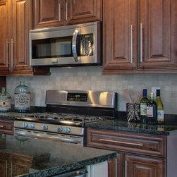 Chocolate color maple kitchen - Kitchen Cabinetry