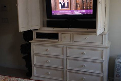 Example of a mid-sized classic master carpeted and beige floor bedroom design in New York with white walls