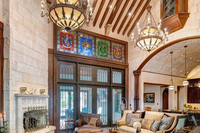 Large elegant formal and open concept dark wood floor living room photo in Austin with beige walls, a standard fireplace and no tv