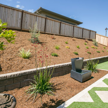 Grass and Pavers Backyard Design Ideas