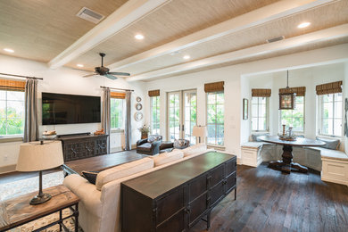 Example of a tuscan living room design in Tampa