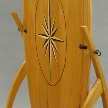 Mahogany standing mirror with inlaid compass rose
