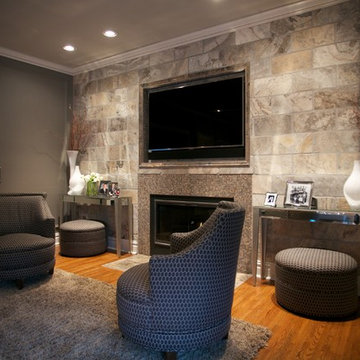 Stone Tile Wall Living Room with Embedded TV and Fireplace