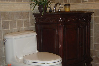 This is an example of a traditional powder room in Newark.
