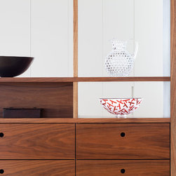 A two-sided storage system - Display & Wall Shelves