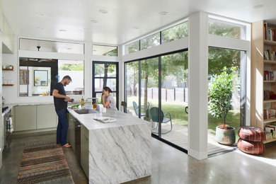 Example of a transitional home design design in Austin