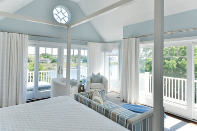 Example of a beach style bedroom design in Boston
