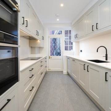 White In Frame Shaker Style Galley Kitchen