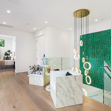 Beverly Hills Entry with Floating Staircase and Custom Feature Wall