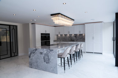 This is an example of a contemporary kitchen in Kent.