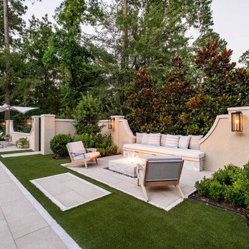 Rectangular pool, covered patio and kitchen, outdoor shower, landscaping