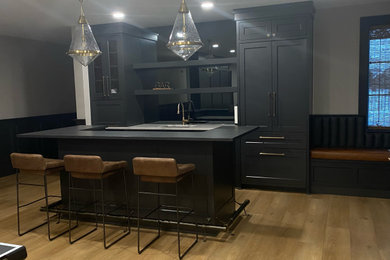 Example of a minimalist home bar design in Other
