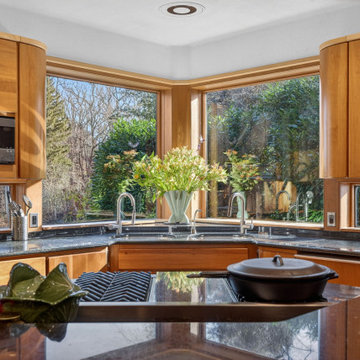 Luxury Mid-Century Kitchen with Custom Wood Cabinetry and Stone Countertops