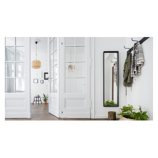 Bright Minimalist Entryway with Natural Accents in Hertford ...
