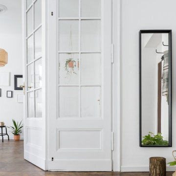 Bright Minimalist Entryway with Natural Accents in Hertford