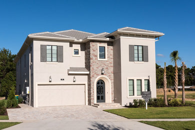 Example of a transitional exterior home design in Orlando