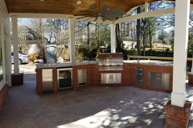 Large white brick exterior home photo in Atlanta