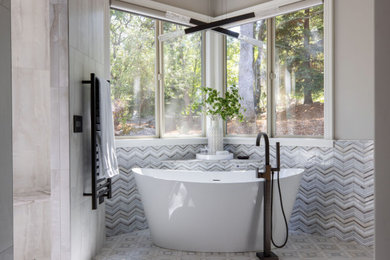 Large transitional master porcelain tile and double-sink bathroom photo in Sacramento with shaker cabinets, brown cabinets, beige walls, an undermount sink, quartzite countertops, a hinged shower door and a built-in vanity