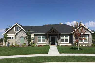 Inspiration for a mid-sized craftsman brown two-story mixed siding house exterior remodel in Boise with a hip roof and a shingle roof