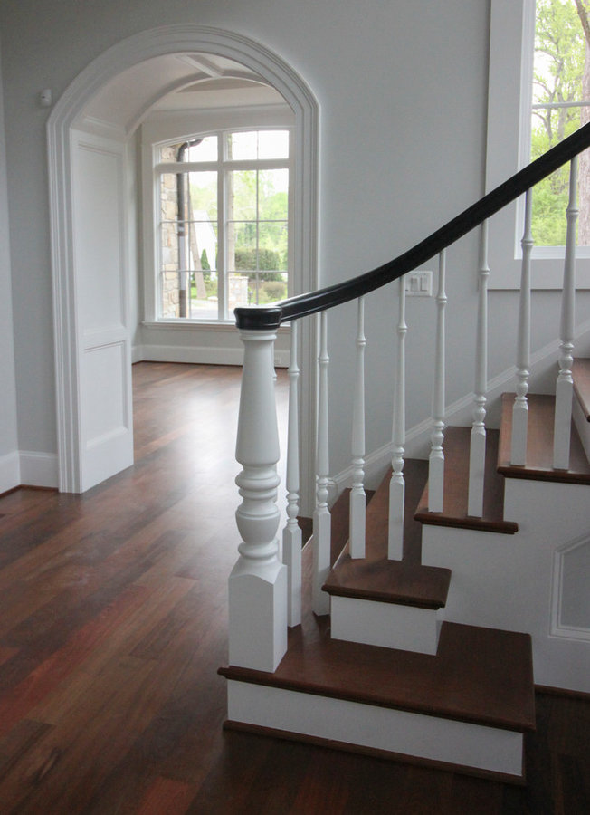 Powerful Impression by Floating Staircase in Suburban Foyer