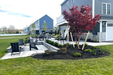 Patio kitchen - mid-sized contemporary backyard concrete paver patio kitchen idea in Providence