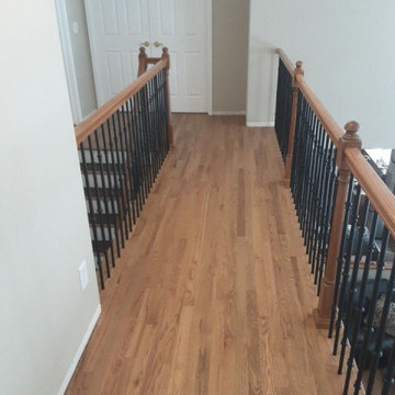 Red oak floor and handrail after