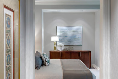 This is an example of a mid-sized transitional master bedroom in Dallas with grey walls, carpet and grey floor.