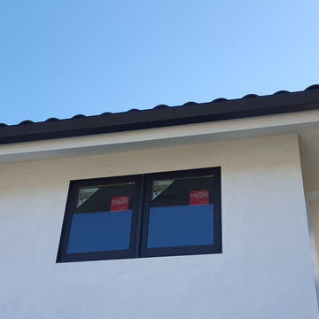 Huntington Beach California, White Fascia Wrap, Black 6 inch Angle Face Gutters