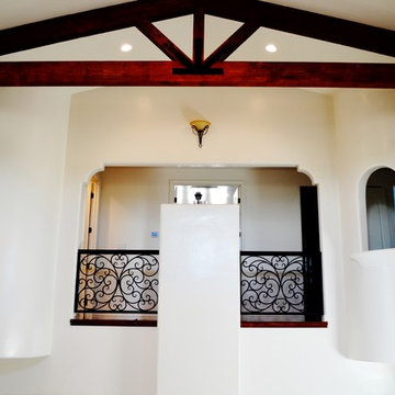 Vaulted ceiling with exposed beam trusses