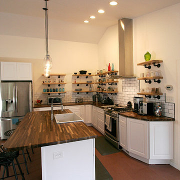 Open Concept Kitchen with Natural Elements and Industrial Touches