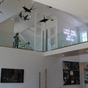 Glass Balustrade with Aluminum Base Rail Finished with Satin Brass Cladding