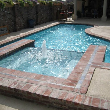 Pool and spa combo with antique brick tile