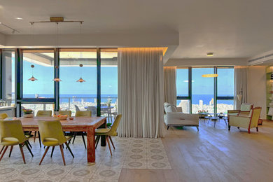 Example of a large eclectic living room design in Tel Aviv
