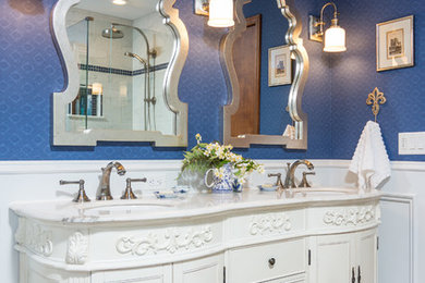 Bathroom - mid-sized traditional master white tile and marble tile dark wood floor and brown floor bathroom idea in Detroit with furniture-like cabinets, white cabinets, purple walls, an undermount sink, a hinged shower door, a one-piece toilet and marble countertops