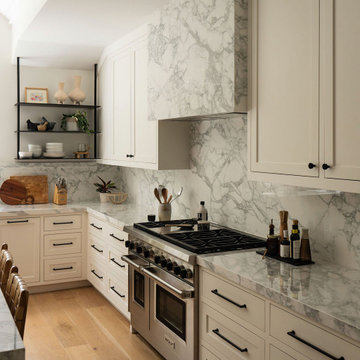 Marble Slab Range Backsplash with Plaster Hood Detail