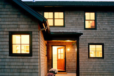 Example of a large classic entryway design in Bridgeport with a medium wood front door
