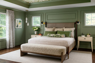 Inspiration for a mid-sized transitional master dark wood floor, brown floor and tray ceiling bedroom remodel in DC Metro with green walls