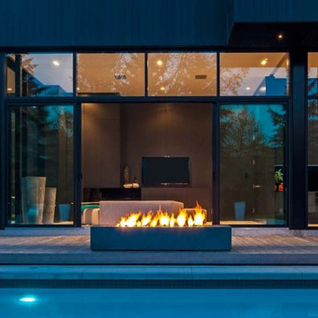 Modern Patio Design with Rectangular Outdoor Fireplace from Stardust Modern Desi