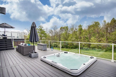 Inspiration for a huge contemporary backyard deck remodel in Columbus