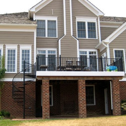 s057 Spiral Staircase with custom landing from Deck to patio in Crozet, Virginia - Products