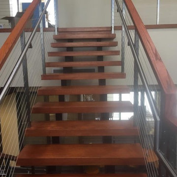 Double steel stringer open risers and cable railing
